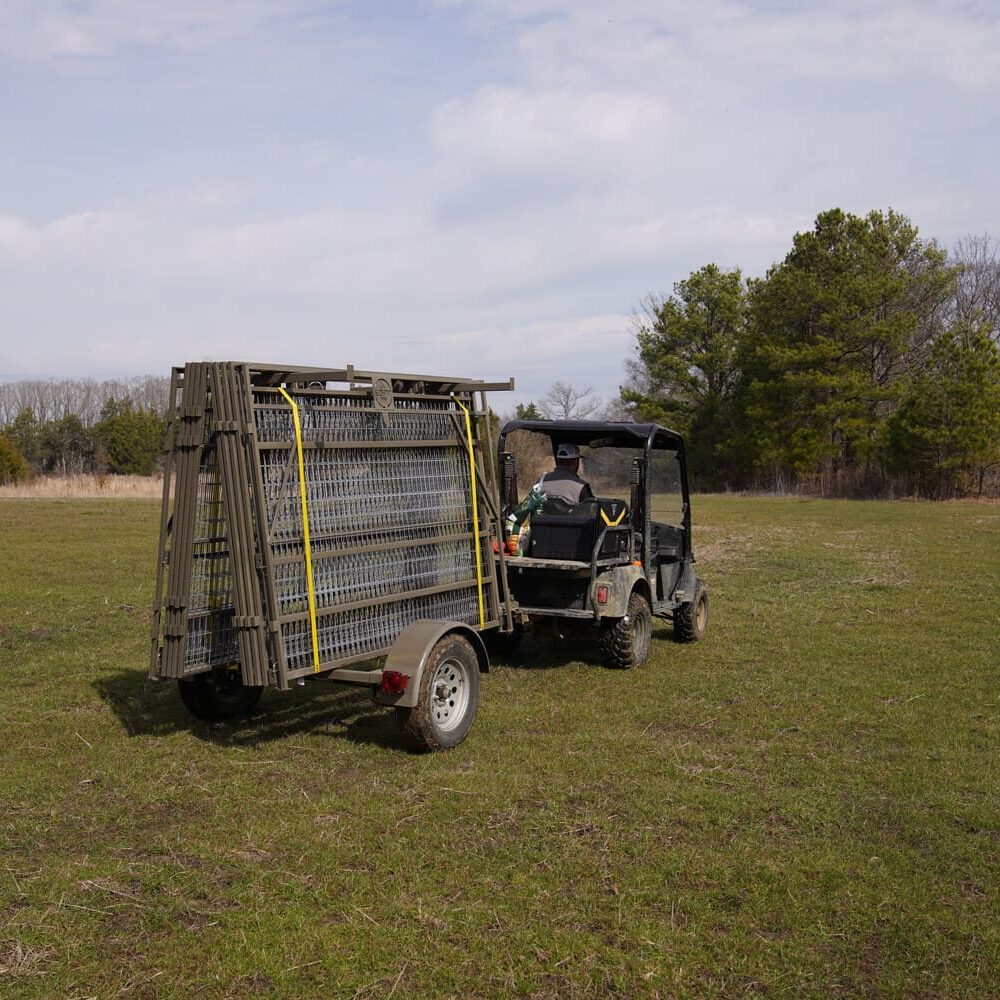 trailer with feral hog trap